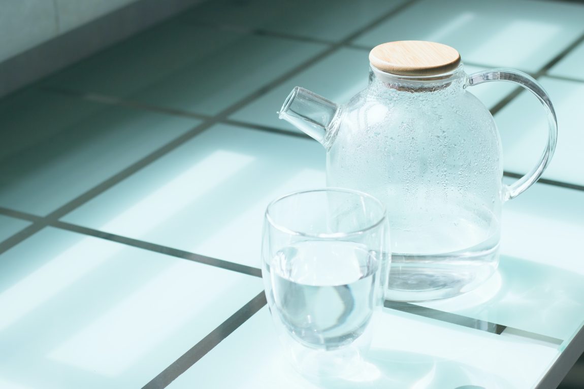 plain water pitcher on table