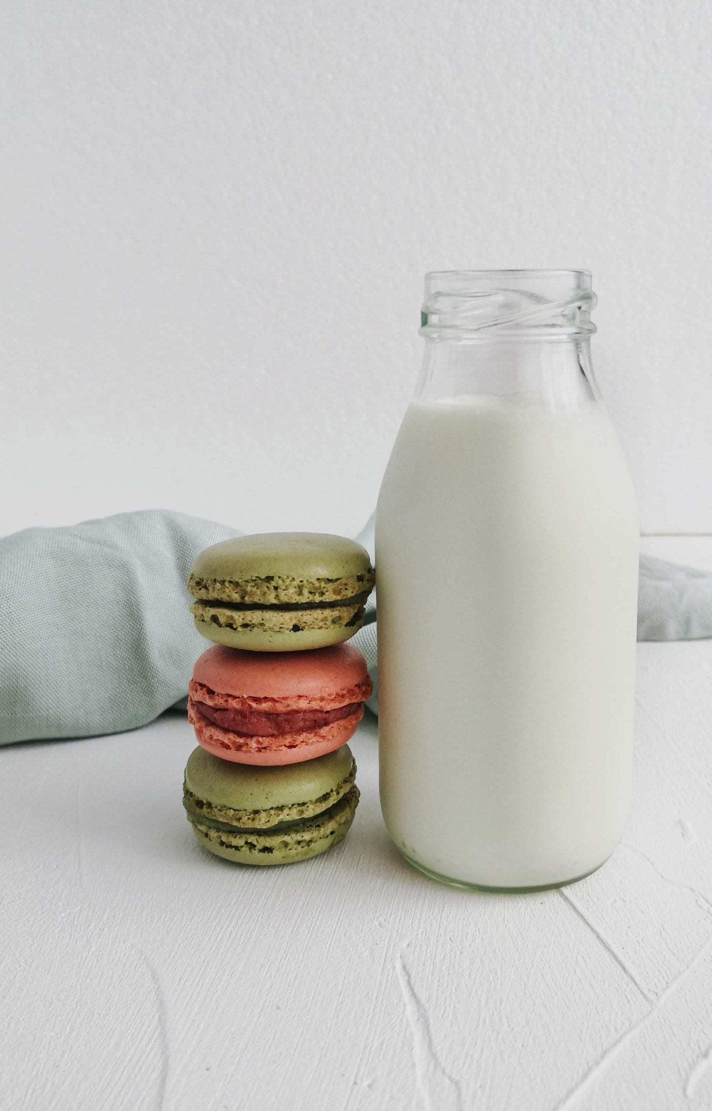 Bottle of milk and macarons for healthy lifestyle changes